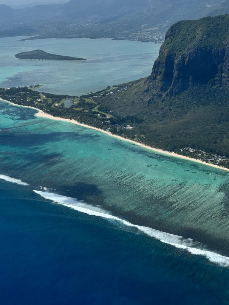 Stunning aerial view of Le Morne Brabant and turquoise waters on Mauritius island, perfect for travel and nature enthusiasts.